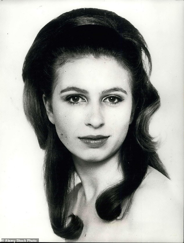 A photo released of the princess to mark her 19th birthday in 1969, of Anne with her hair styled in loose curls past her shoulder.