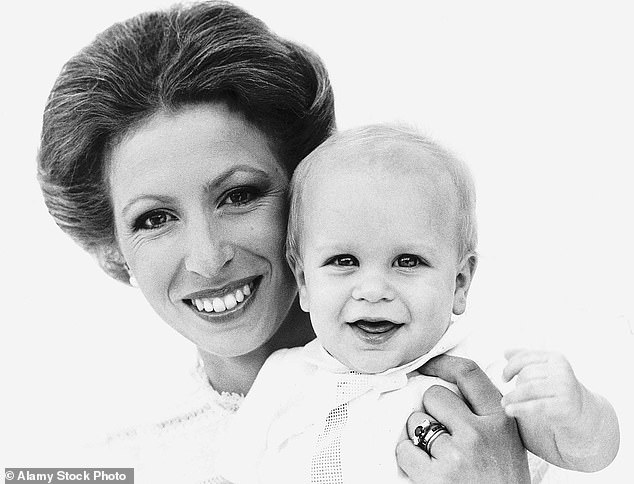 The princess with her son Peter Phillips in 1978 wearing her hair as a precursor to her best-known style.