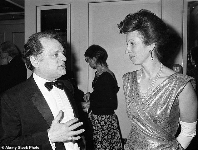 Anne, pictured with a curly '80s-style pompadour, talks to actor David Jason at the BAFTA Awards in 1988.