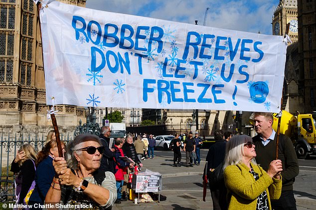 A banner at the demonstration in London outside Parliament against Labour's decision to means-test winter fuel payments.