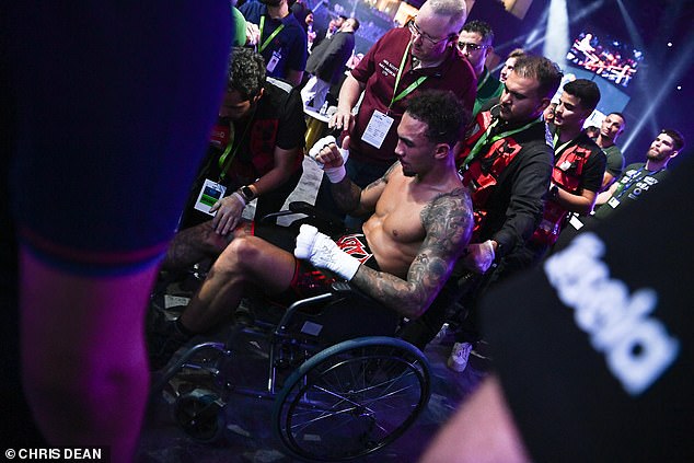 The 27-year-old was taken back to his dressing room in a wheelchair after the fight.