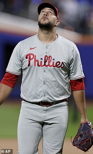 Phillies pitcher Carlos Estevez leaves the field.