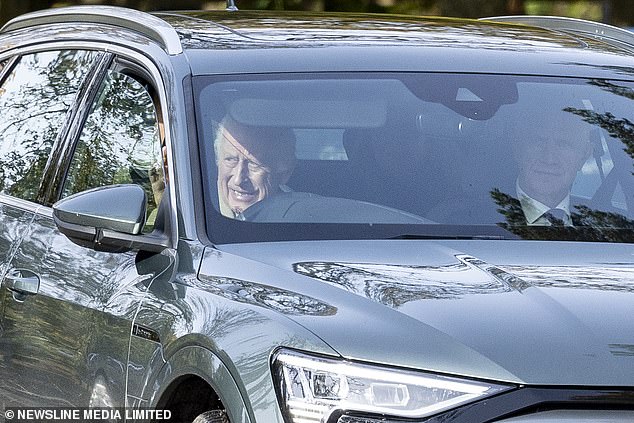 The 75-year-old monarch was seen driving his Audi while making the trip through Scotland, near Balmoral.