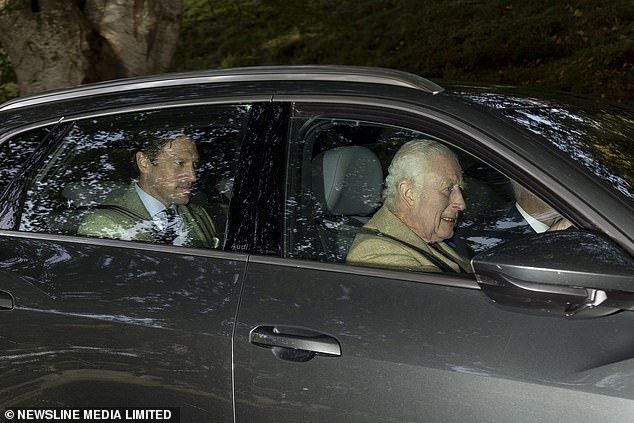 While behind the wheel, the King, accompanied by guests, seemed focused as he drove along the roads towards the Church.