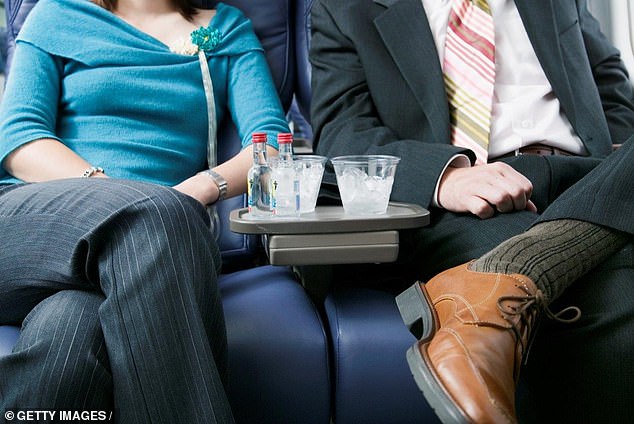 Mary, a flight attendant for a major US airline, revealed that she waits for the other passengers in the aisle to take their drinks before reaching out to place her elbow on the armrest.