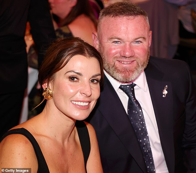 Coleen appears here with her husband Wayne, former England and Manchester United striker, at Nordoff Robbins' Legends of Football event in London on Monday.