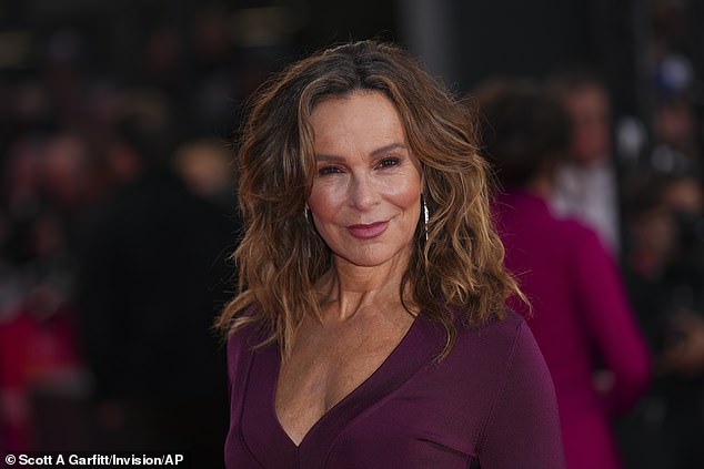 The brunette beauty, who plays Marcia in the new film, posed up a storm as she arrived on the Royal Festival Hall red carpet.