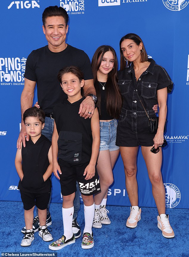 The family seen at Ping Pong 4 Purpose in Los Angeles in July 2023