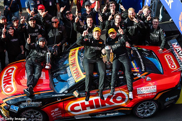 Kostecki and Hazlewood (pictured celebrating the win with their Erebus team) shared the bad news on Monday morning.