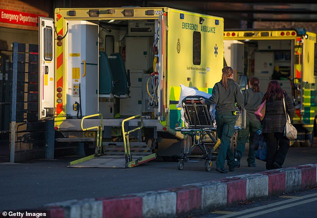 A patient is transferred from an ambulance parked outside the Accident and Emergency department at Gloucestershire Royal Hospital on January 6, 2015 in Gloucester, England.