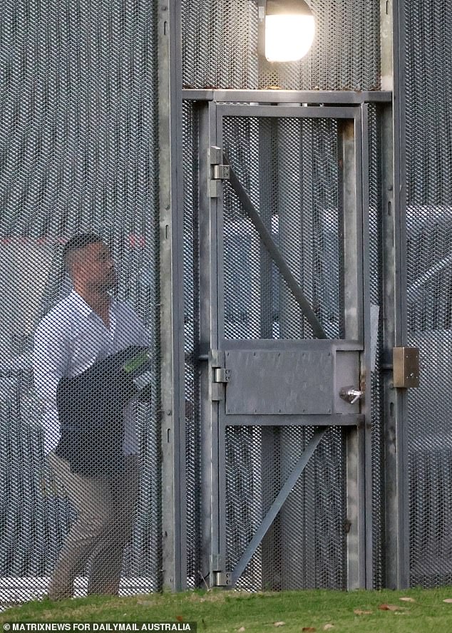 The 36-year-old is pictured leaving prison after serving time for a rape conviction that was later overturned.