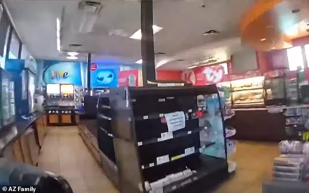 More footage filmed inside the store shows a third Phoenix police officer interviewing the Circle K store employees who had summoned them in the first place.