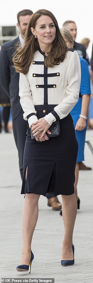 The other pencil skirt in the princess's wardrobe is the work of Alexander McQueen. She is seen wearing it (above) during a visit to Portsmouth in 2016.