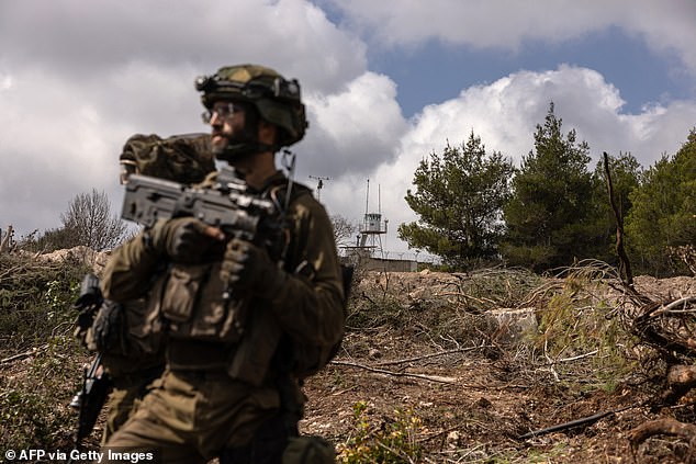 Israeli troops patrolling near a United Nations Interim Force in Lebanon (UNIFIL) base in the Naqoura region of southern Lebanon, close to the border.