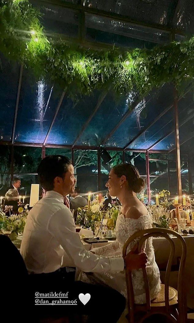 Matilde and Danny were also photographed gazing lovingly into each other's eyes during the reception dinner, with tables laden with candles and plants, while the glass ceiling was adorned with hanging vines.