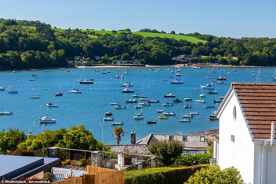 Above is the village of Helford Passage, home to The Ferry Boat Inn pub, which serves 