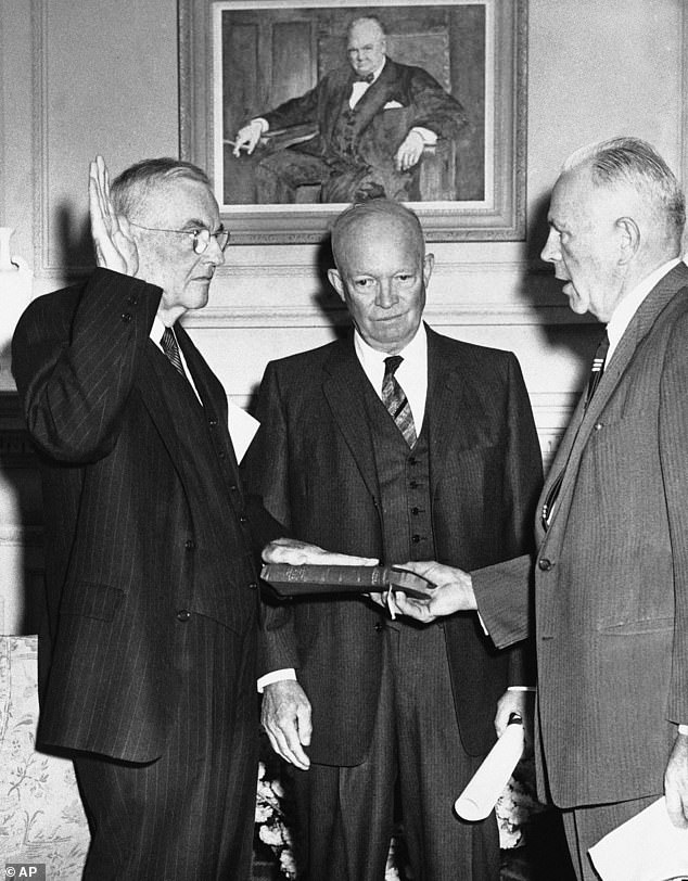 Former Secretary of State John Foster Dulles (left) is sworn in as special foreign policy consultant on April 23, 1959. President Dwight Eisenhower was present at the ceremony.