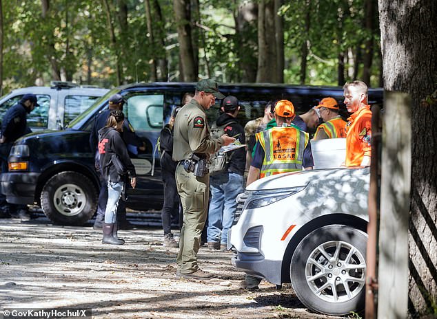 Law enforcement is seen searching for Charlotte in October 2023.