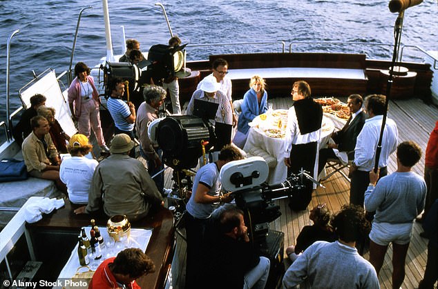 FILE PHOTO: The filming of the 1983 James Bond film Never Say Never Again aboard a ship then called Nabila and owned by Saudi businessman Adnan Khashoggi.