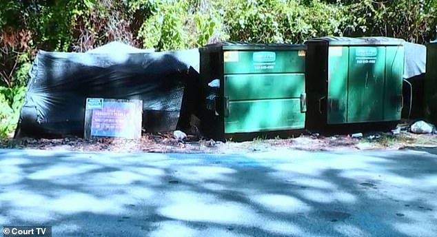 Prosecutor Tim Dean shared a photo of the trash bins while telling the jury: 