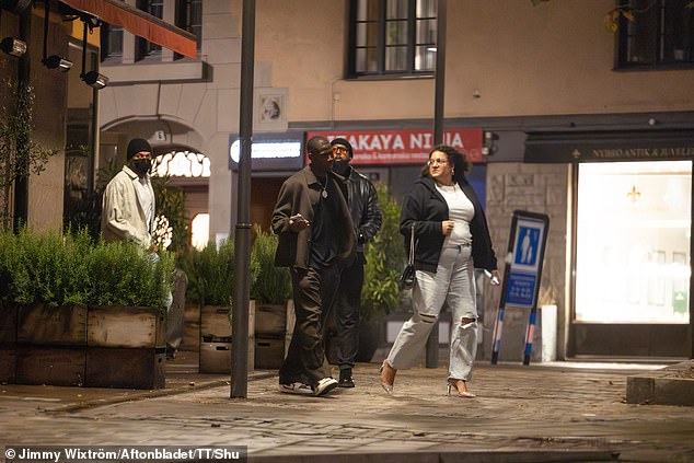 Mbappé is pictured above leaving the Chez Jolie restaurant in Stockholm with his friends on Thursday night.