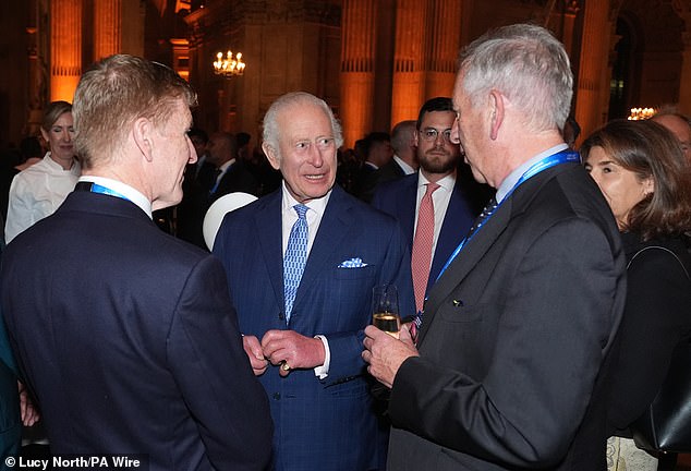 The 75-year-old monarch smiled as he shook hands with esteemed guests at the event, which took place after the Government's International Investment Summit.