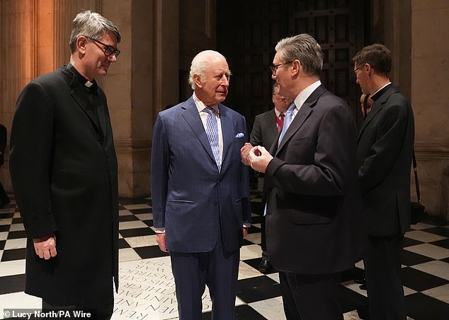 Charles and the politician appeared to be in deep conversation when they were photographed at the event.