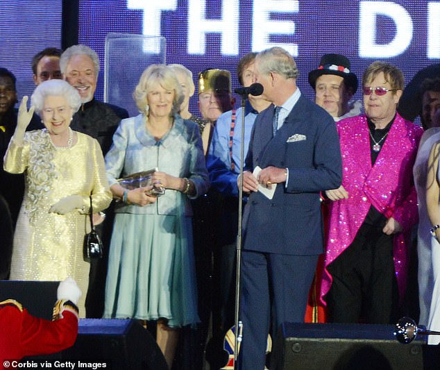 Elton John appears on stage at Queen Elizabeth II's Diamond Jubilee celebration in 2012.