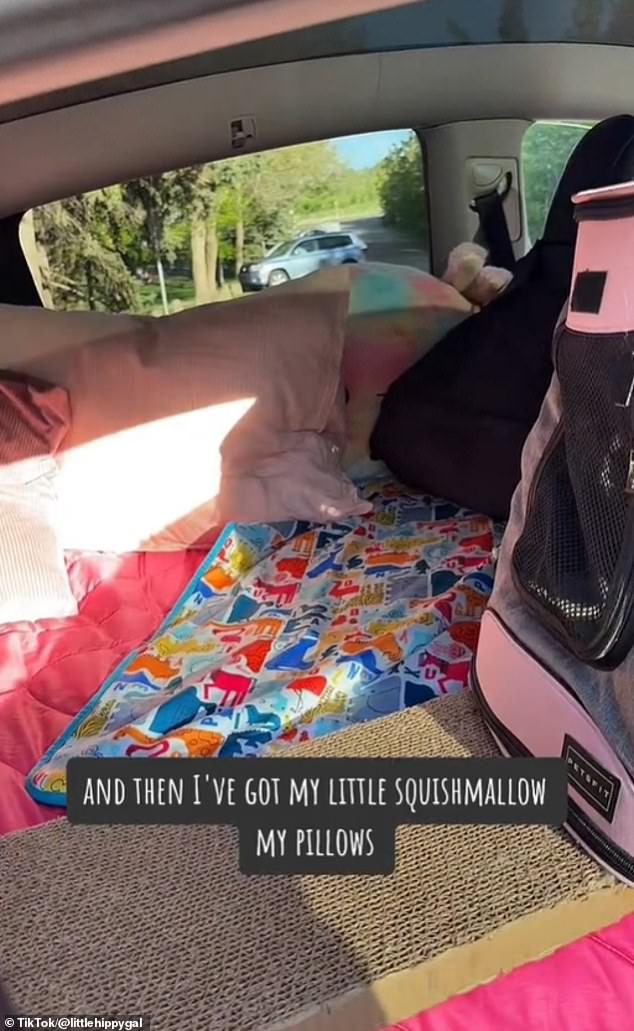 Stephanie sleeps in the back of the car, lowering the passenger seats so a double mattress can fit through the trunk.