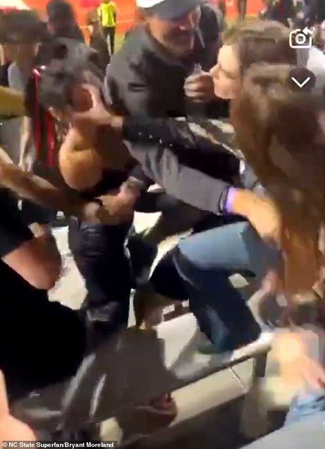 The women continued to fight before some nearby male fans separated them.