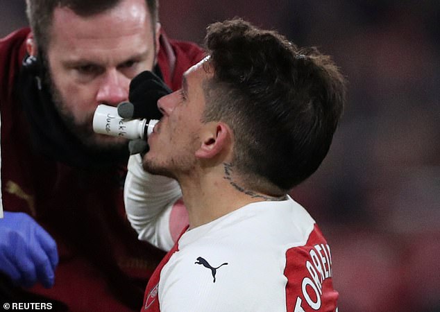 Former Arsenal star Lucas Torreira drinks pickle juice during his team's victory over Chelsea in 2019