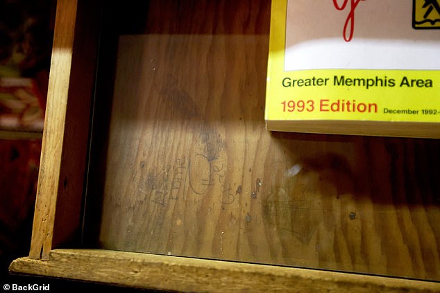 There was also an open kitchen drawer with a Memphis phone book and the words 