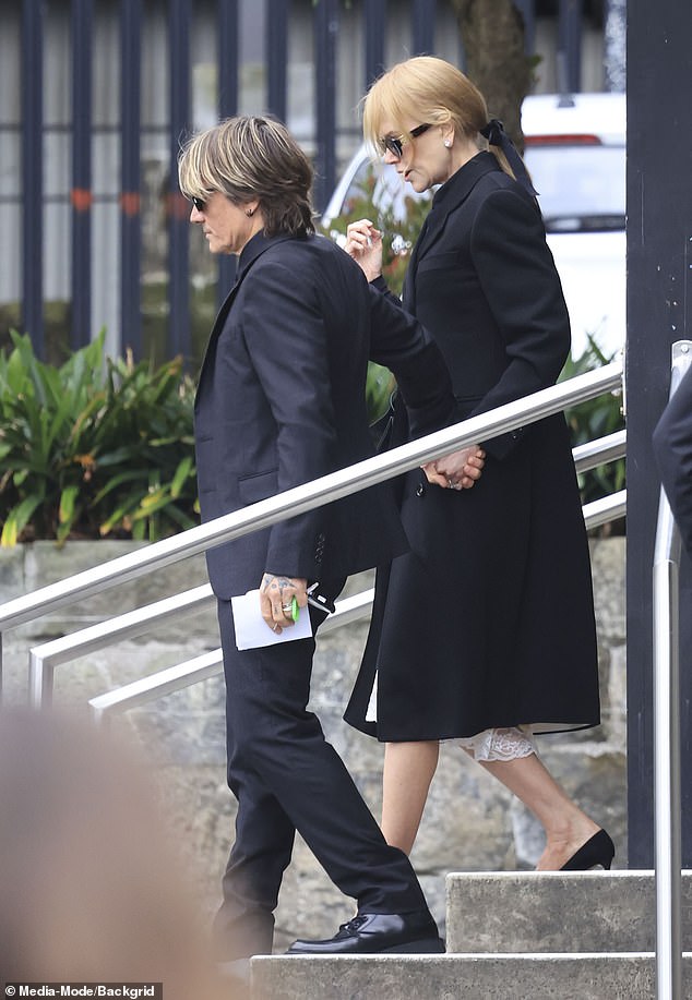 Nicole was seen arriving at the church hand in hand with her loving husband Keith, 56, as he offered her support throughout the service.