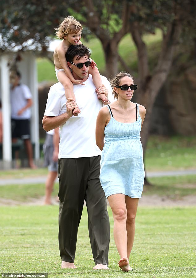 The cricket superstar is shown carrying his son Albie on his shoulders while his wife Becky shows off her growing baby bump.