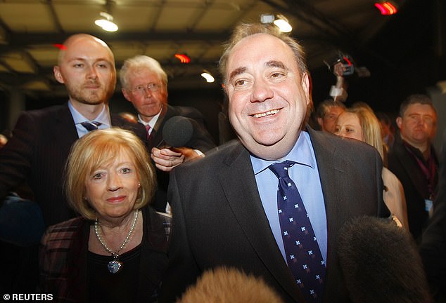 Scotland's First Minister and leader of the Scottish National Party, Alex Salmond, arrives with his wife Moira Salmond for the recount of the 2011 Scottish Parliament election.