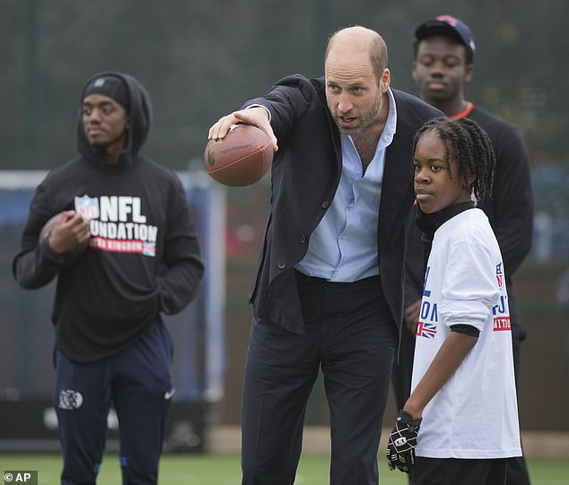 The prince seemed completely immersed in the game, pointing around and gesturing.