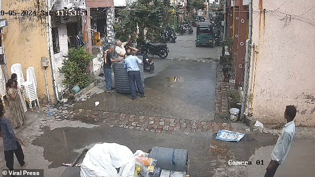 Neighbors ran outside after hearing a loud bang and were surprised to find the woman standing inside the upright container.