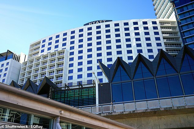 Minigle told officers Ms Lovell was standing on a chair on the balcony shortly before falling from the Hyatt Regency hotel (pictured).