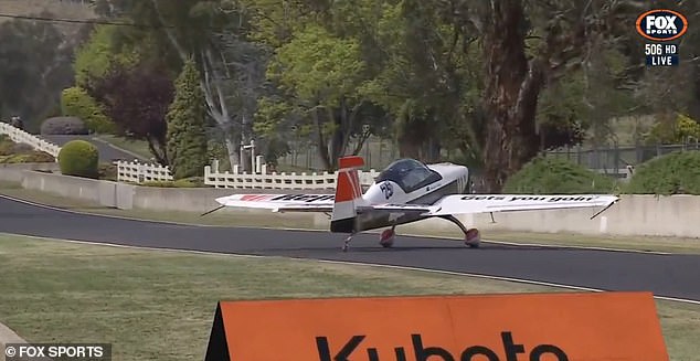 The plane landed on the runway before veering toward a concrete wall to the right of the runway.