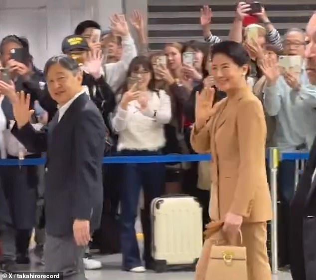 In a video that has accumulated more than 10 million views on social media, the Emperor and Empress are seen greeting the public.