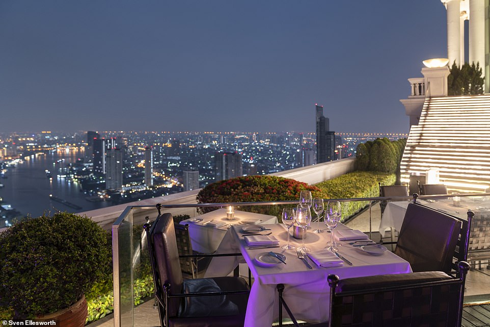 Hostesses in gold dresses serenely escort diners through the restaurant's entrance on the 64th floor, says Ailbhe