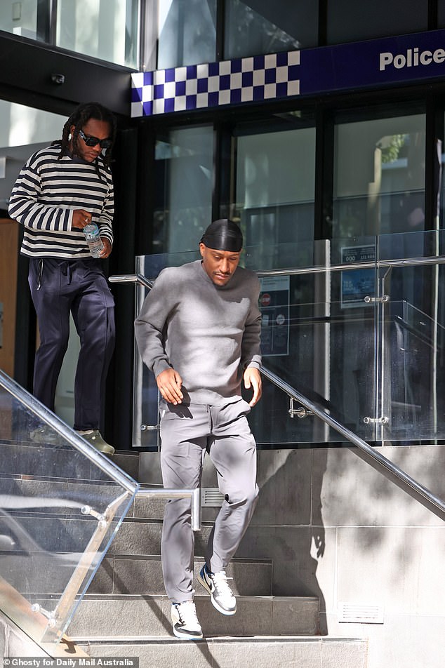 Yung Filly, seen leaving the police station after appearing on bail, will face a hearing on December 19.