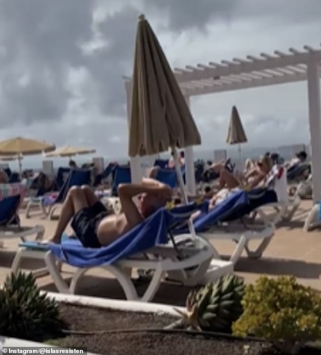 Tourists relaxing by the pool watched as protesters poured into the hotel.