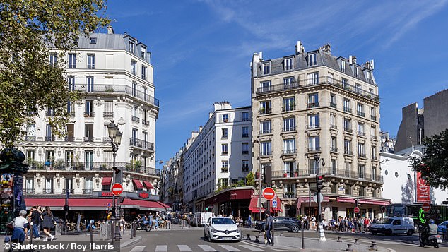 The attack allegedly took place around 12:30 pm on Monday in a sex shop on Boulevard de Clichy (pictured), in the 9th arrondissement of Paris (file photo).