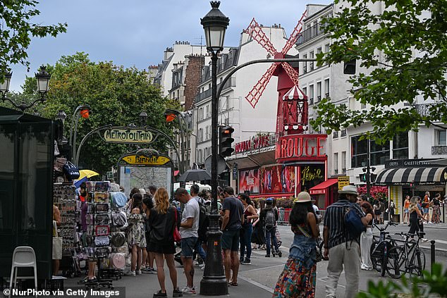 The Boulevard de Clichy (pictured) is a famous Paris street full of erotic sex shops (file photo)