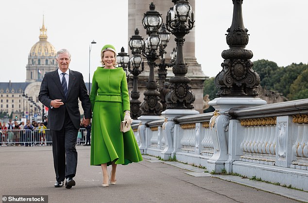 The mother of four looked radiant in a bright green ensemble as she hit the Parisian streets.