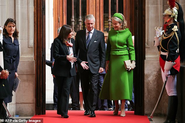 Paris Mayor Anne Hidalgo pictured chatting with Belgian royalty as they arrived in the French capital for a meeting.