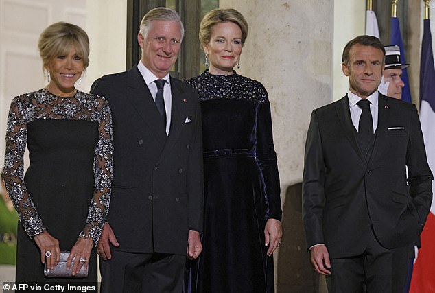 Queen Mathilde, 51, looked elegant as she arrived at the event in a floor-length navy velvet dress.