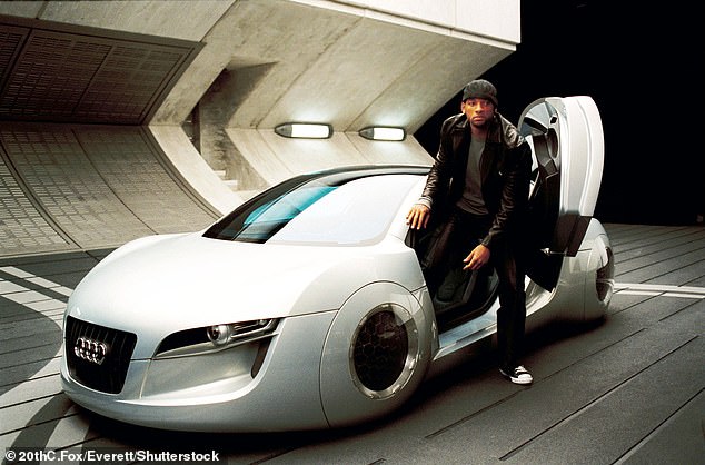 Det. Del Spooner (Will Smith) is pictured with the Audi RSQ, a concept car developed by Audi for use as product placement in the science fiction film.