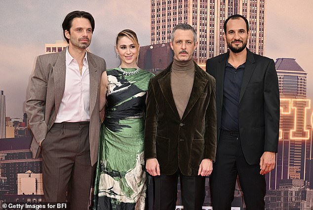 The actress also posed alongside her co-stars Sebastian Stan, (left) Jeremy Strong (center) and director Ali Abassi (right), who looked dapper in smart brown suits.